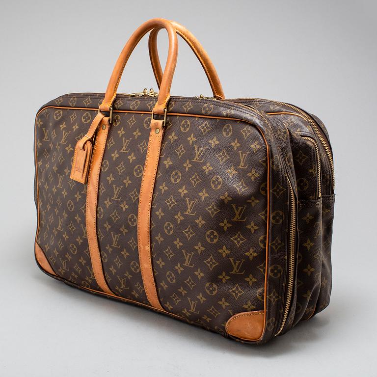 LOUIS VUITTON, 'Sac 3 poches'.