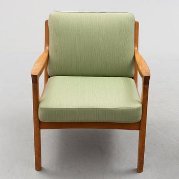 A pair of Ole Wanscher 'Senator' teak easy chairs, for France & Son, Denmark, second half of the 20th century.