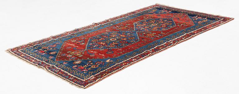 An antique carpet from south caucasus, probably Karabagh, ca 261 x 146 cm.