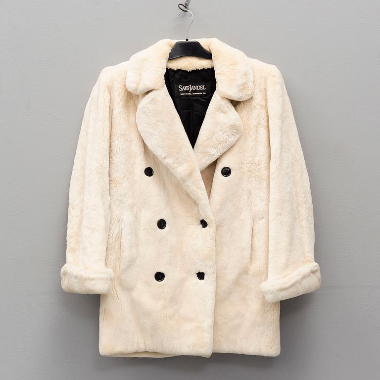 YVES SAINT LAURENT, a fur coat, size ca medium.