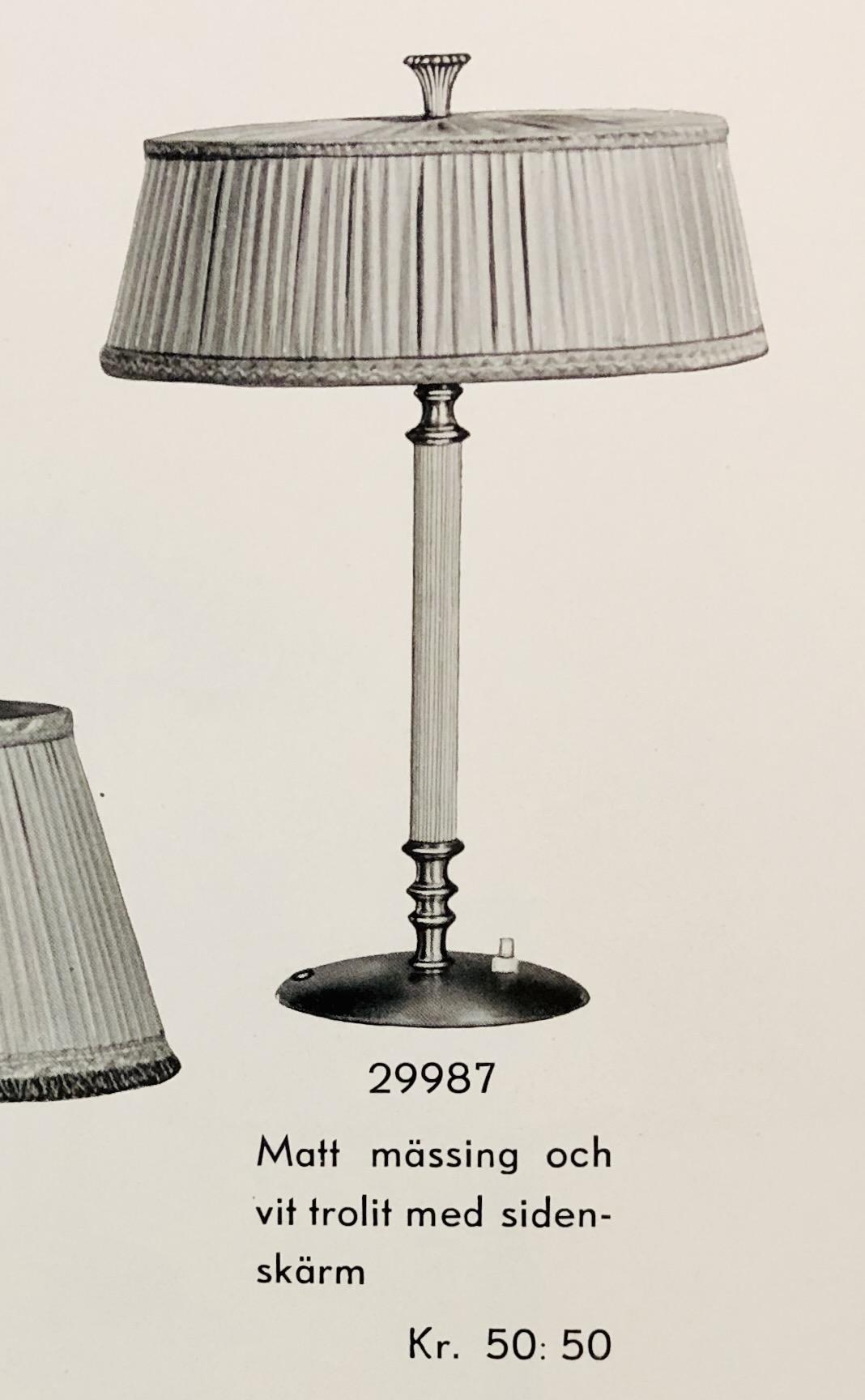 Erik Tidstrand and/or Bertil Brisborg, a pair of table lamps, model "29987", Nordiska Kompaniet 1940s.