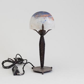 A French early 20th century Art Nouveau Daum table light from Nancy signed Daum Nancy France.