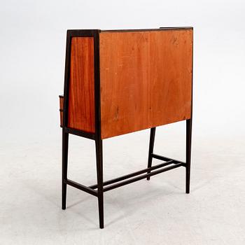 A 1950s mahogany writing desk.