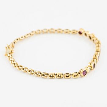 Bracelet, 18K gold with rubies and brilliant-cut diamonds.