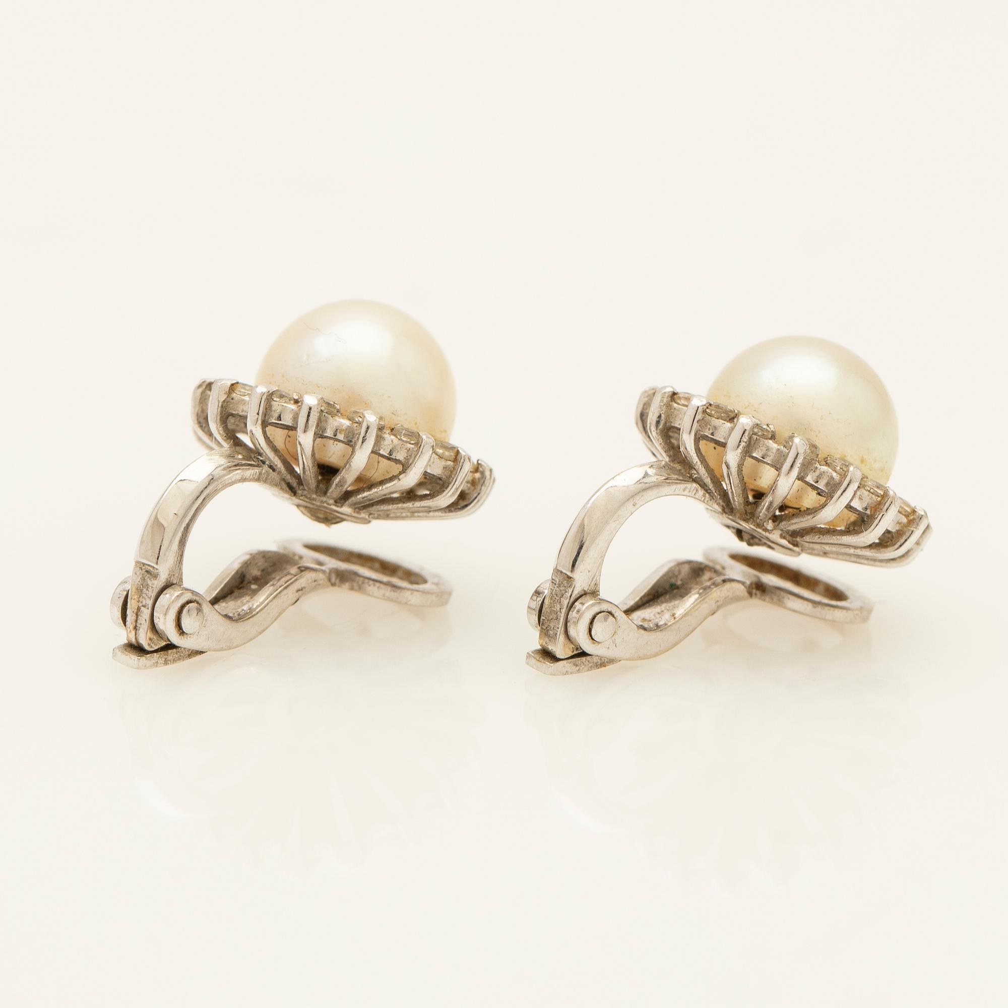 Earrings, a pair, 18K white gold with pearls and diamonds.