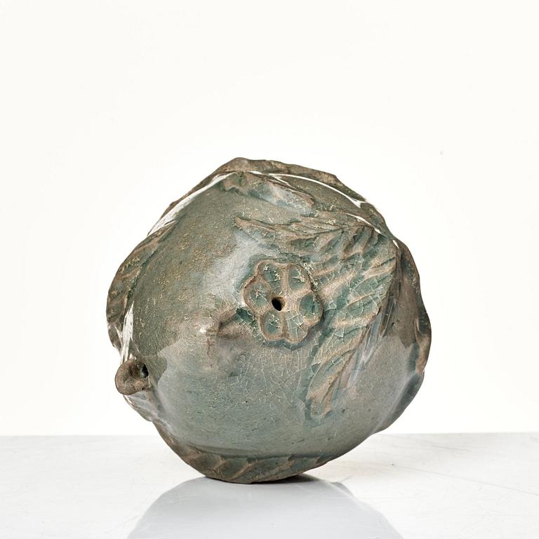 A peach shaped celadon glazed water dropper, Koryo, Korea, 13th Century.