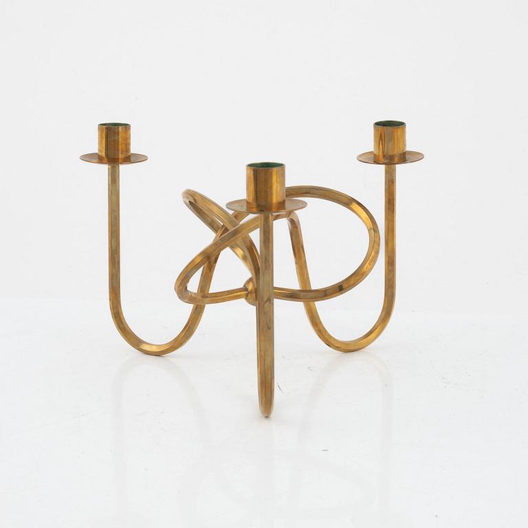 Josef Frank, a brass candelabrum, 'Vänskapsknuten', Firma Svenskt Tenn.