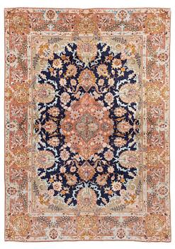 453. A Tabriz carpet, part silk, c. 206 x 147 cm.