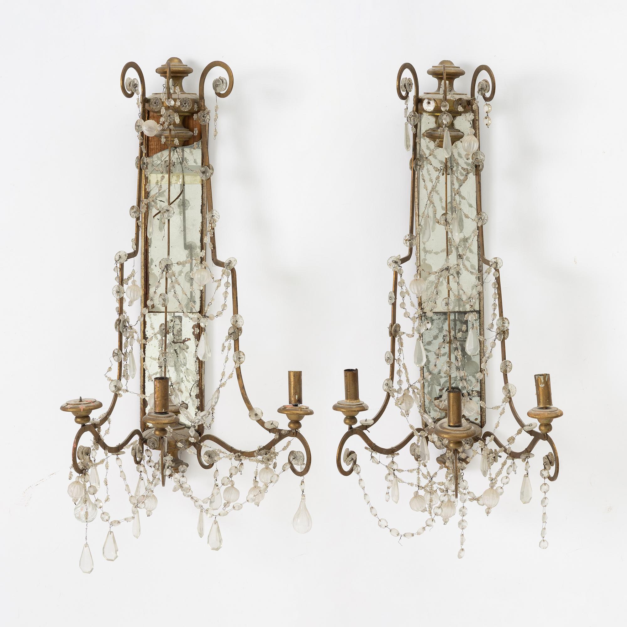 A pair of mirror wall sconces, second half of the 20th Century.