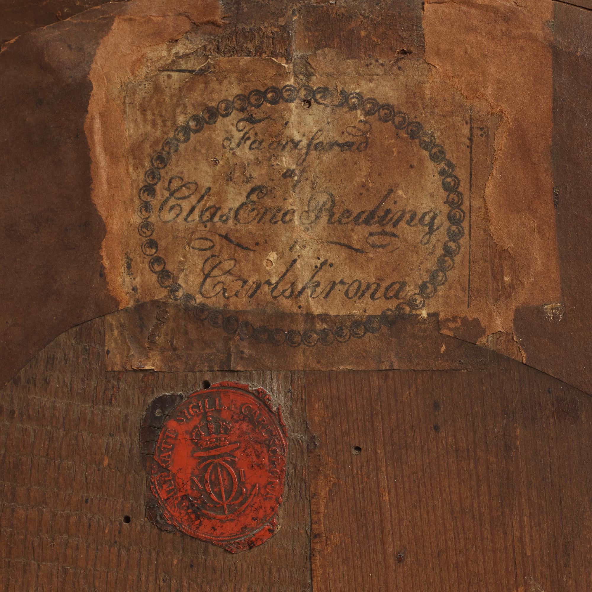 A late gustavian girandole mirror signed by Claes Eric Reding, Karlskrona, (master 1808-1815).