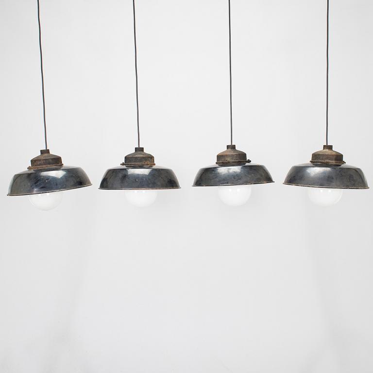 Paavo Tynell, four 1930s pendant lights / industrial lights for Taito.