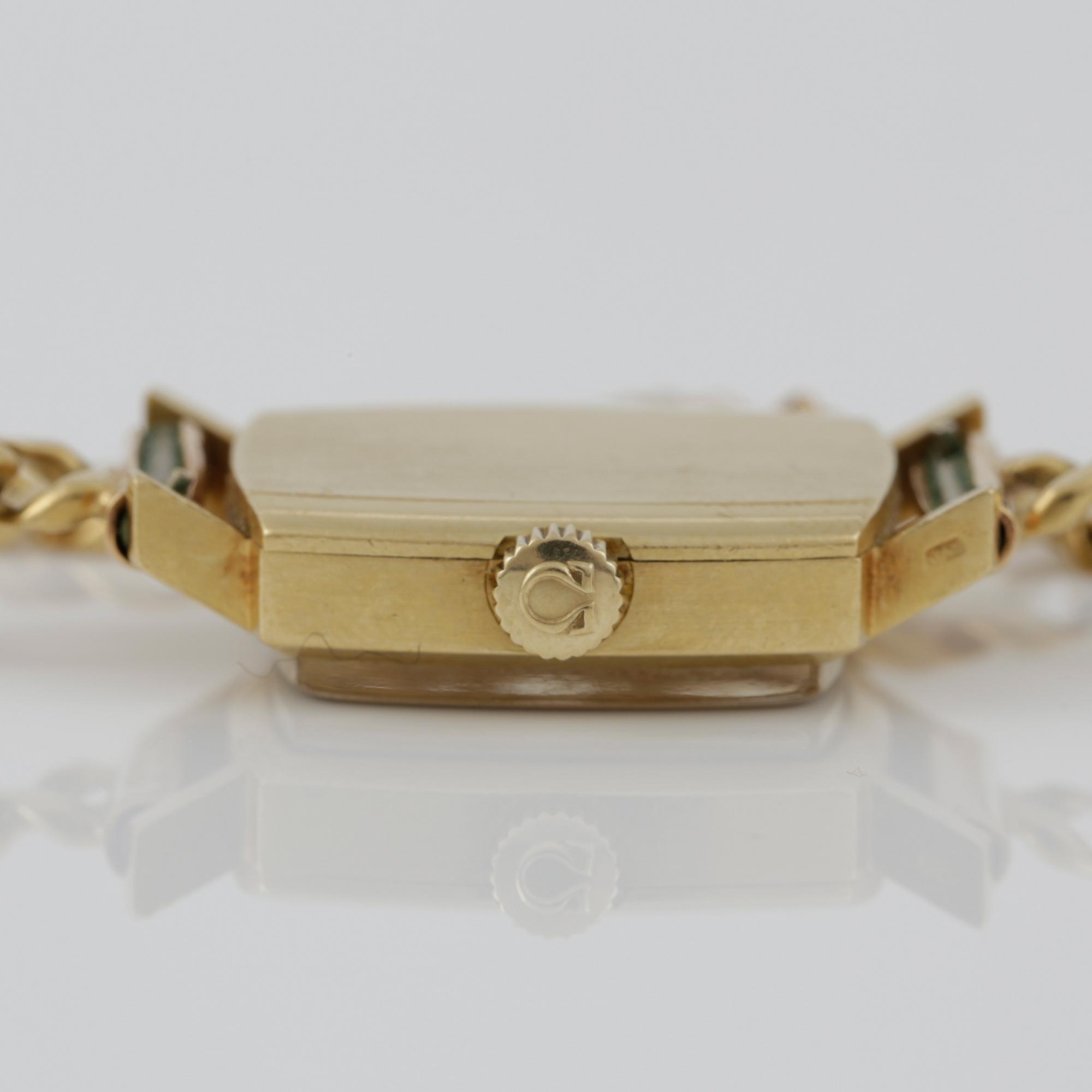 DAMARMBANDSUR, guld 18K, Omega, 1900-tal. Vikt tot ca 23 gram.