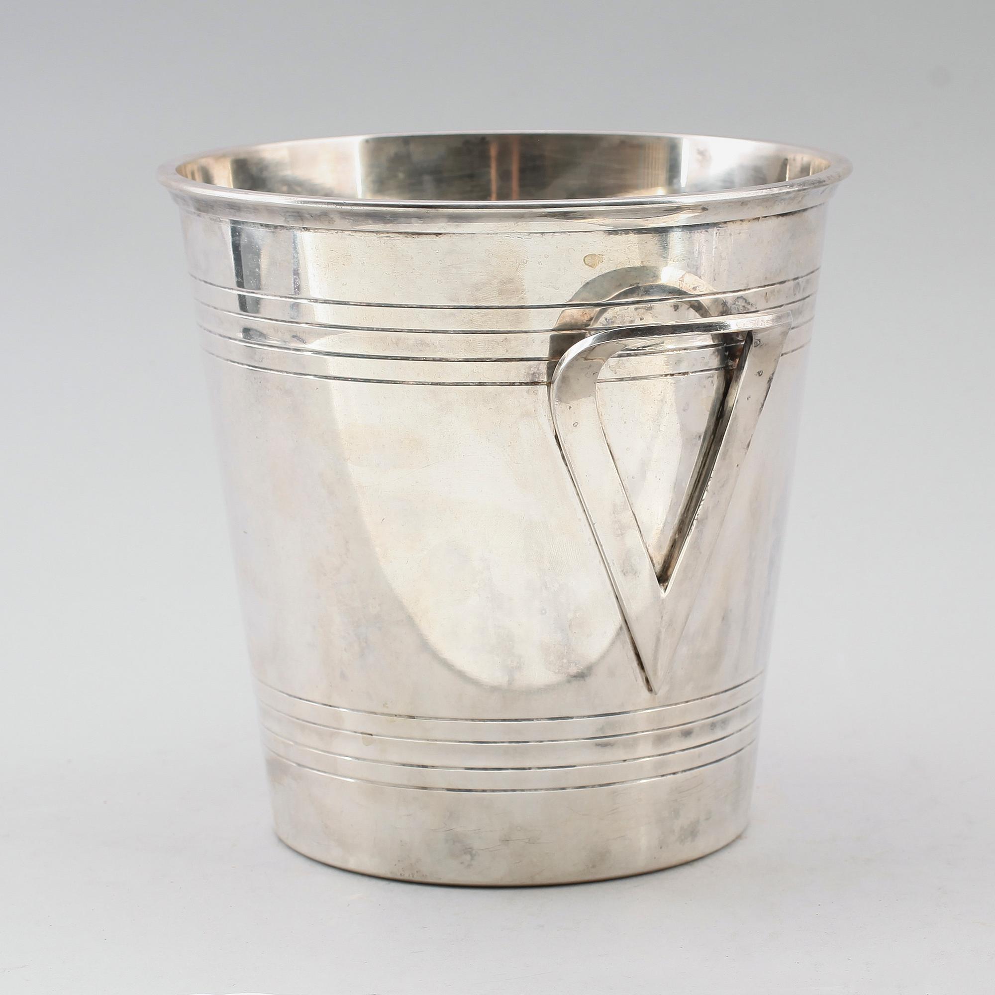 CHAMPAGNEKYLARE, försilvrad mässing, St Médard, 1900-talets mitt.
