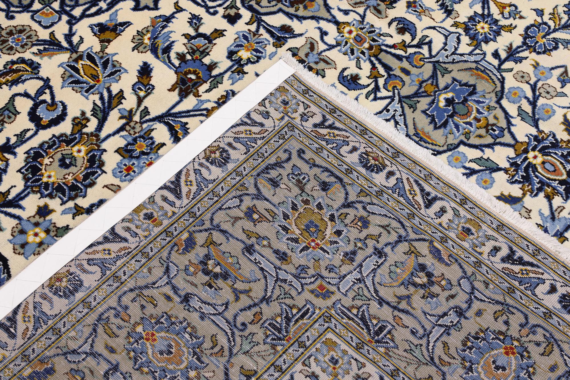 A Keshan carpet, signed, 386 x 281 cm.