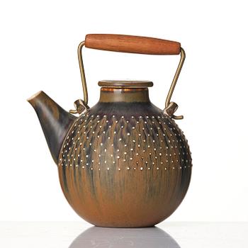 a stoneware teapot and 4 bowls, Gustavsberg Studio, Sweden, 1960-63.