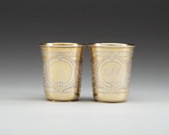 A pair of Russian 19th century silver-gilt beakers, makers mark of Vasily Icanov, Moscow 1893.