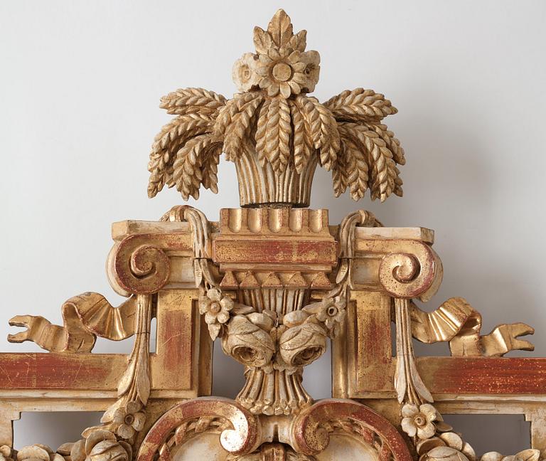 A Gustavian late 18th century two-light girandole mirror.