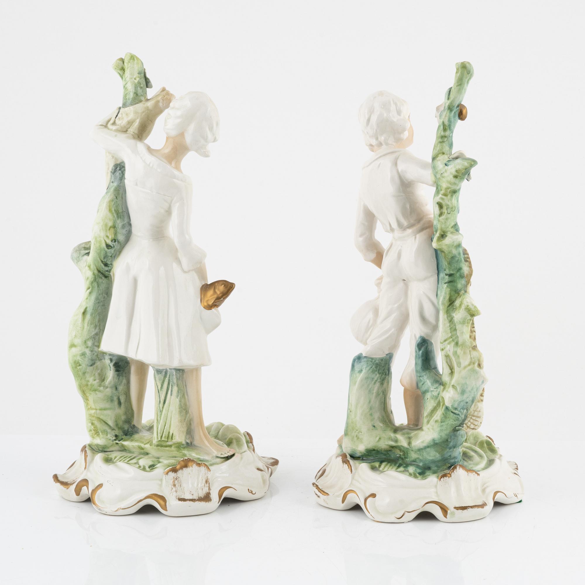 Capodimonte, a pair of creamware figurines, Italy mid 20th century.