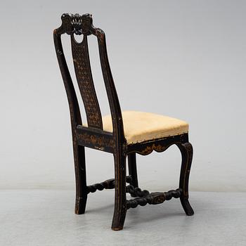 A Danish early 18th century painted baroque chair.