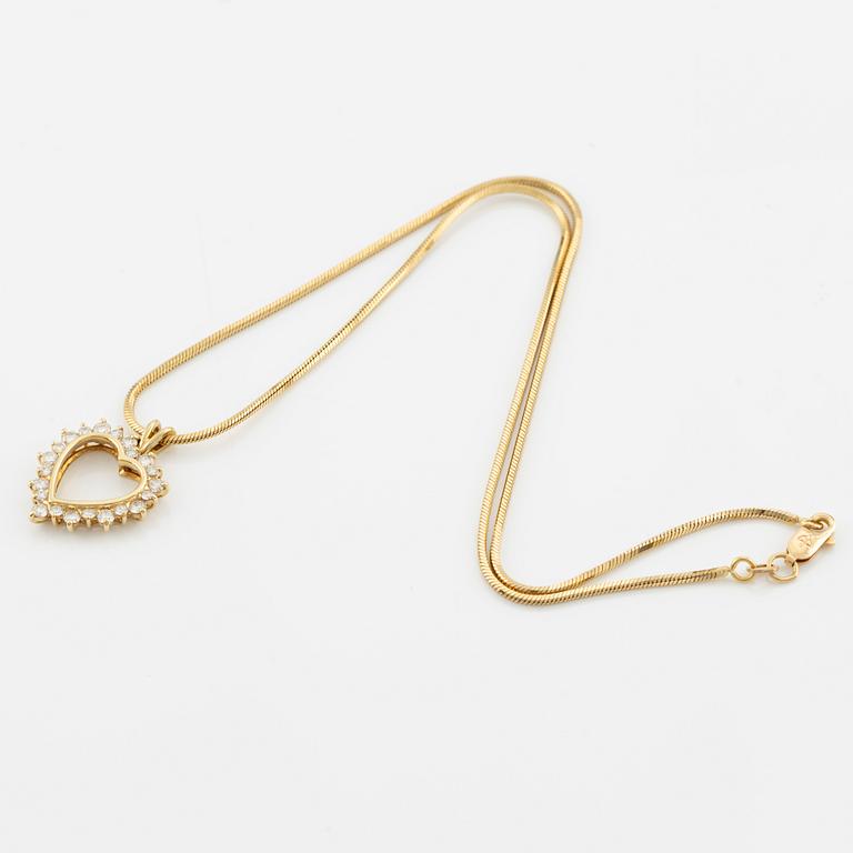 Heart pendant with chain in gold with brilliant-cut diamonds.