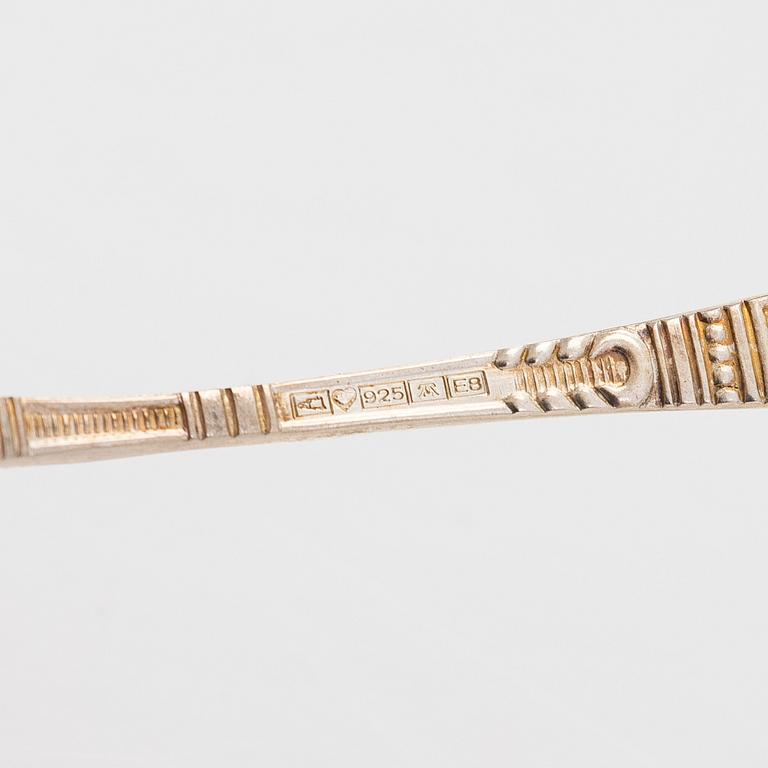 A ten-piece set of enamelled sterling silver coffee spoons, Auran Kultaseppä, Turku 1982.