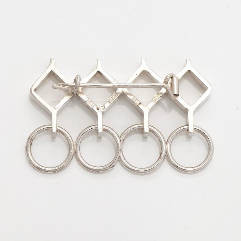 Jorma Laine, a set of two silver pendants, a bracelet and a brooch. Kultateollisuus Oy, Turku 1965-1972.