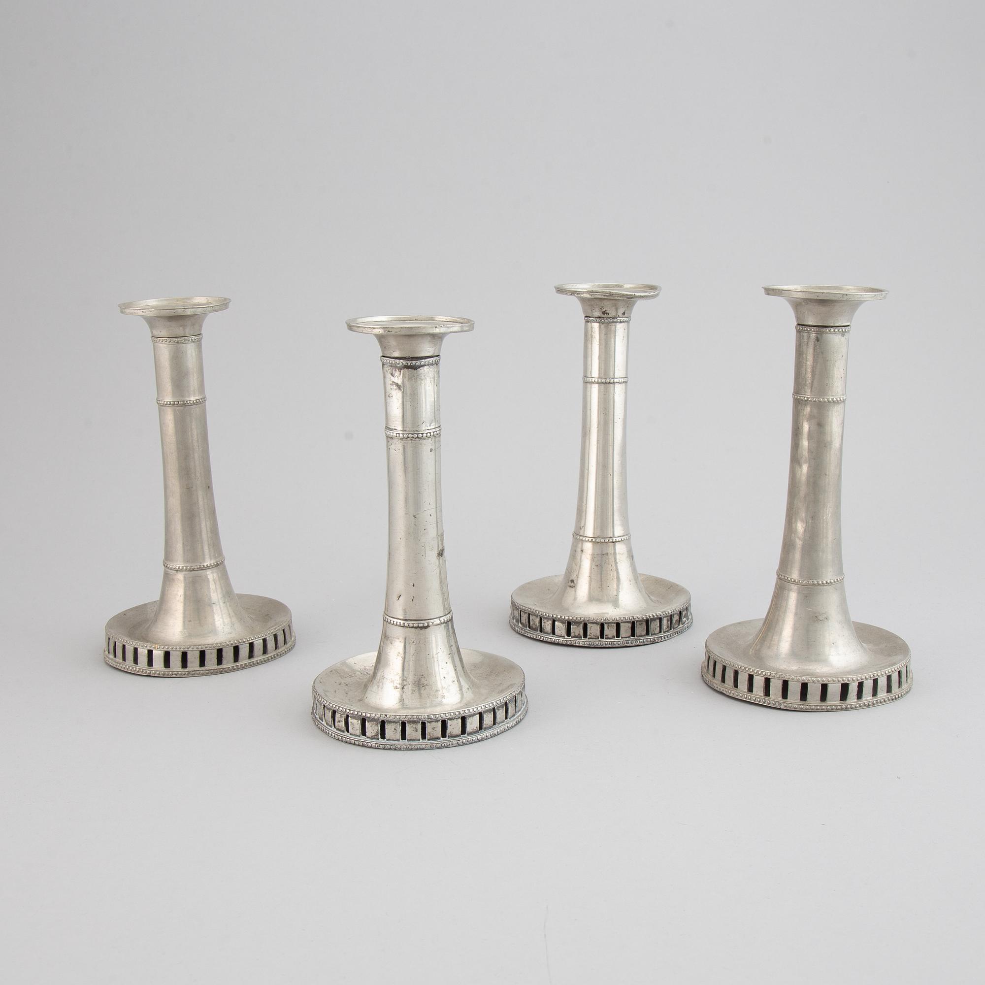 Four Swedish late gustavian pewter candlesticks by Hans Wicksten, Västerås, 1782-1810/14.