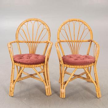 A pair of bamboo and rattan 1960/70s armchairs.