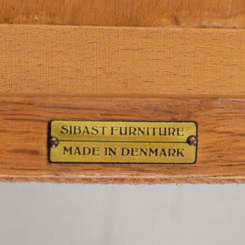 Helge Sibast, A set of four oak and teak chairs, Sibast Furniture, Denmark, mid 20th Century.