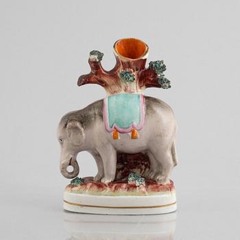 An elephant spill vase, Staffordshire, England, 19th century.