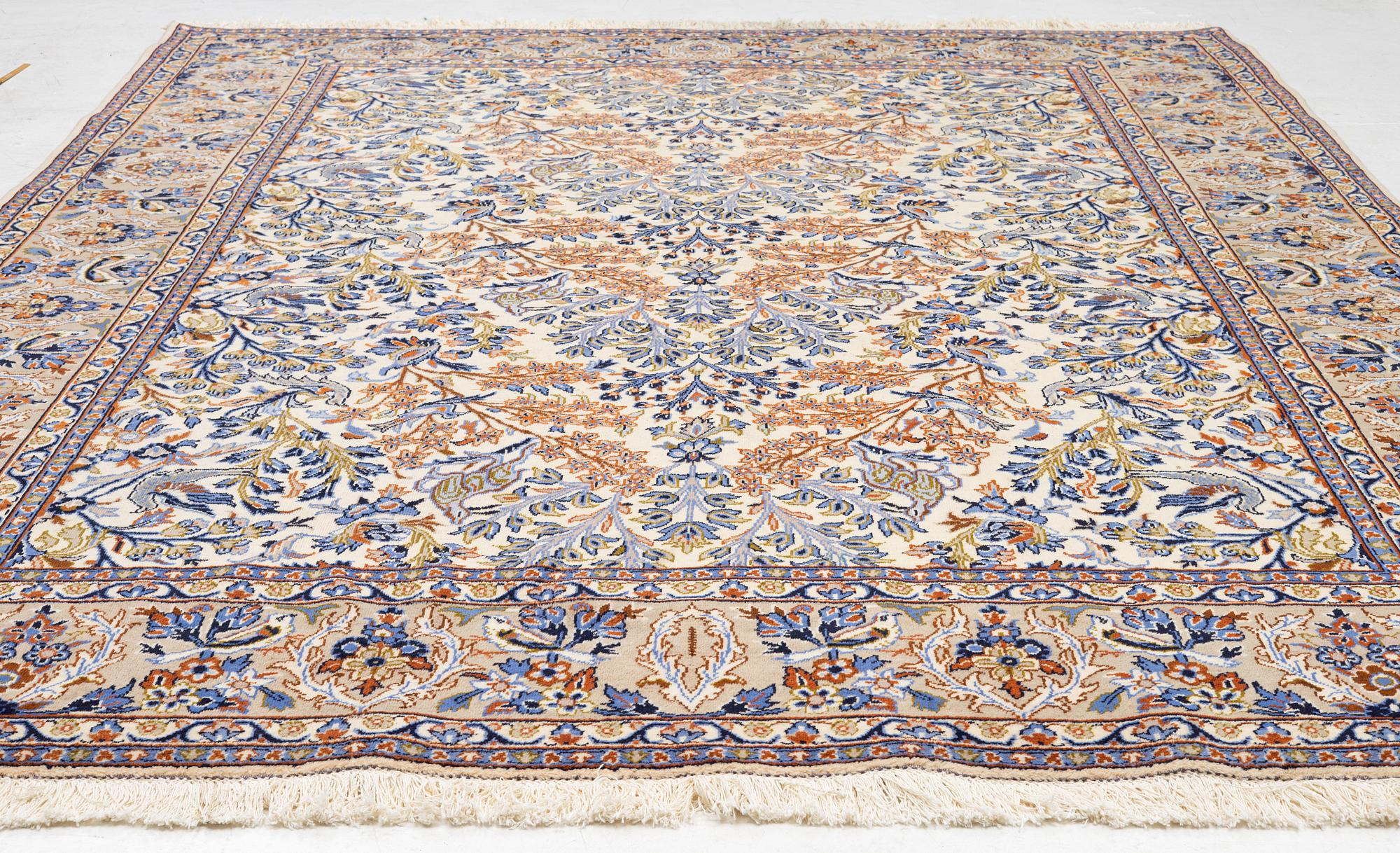 A Najafabad carpet, c. 335 x 255 cm.