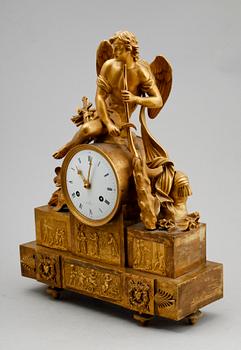 A French Empire early 19th century gilt bronze mantel clock.