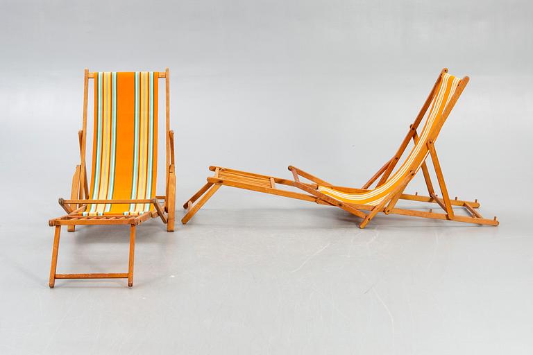 Sun loungers, a pair of footstools, 1950s.