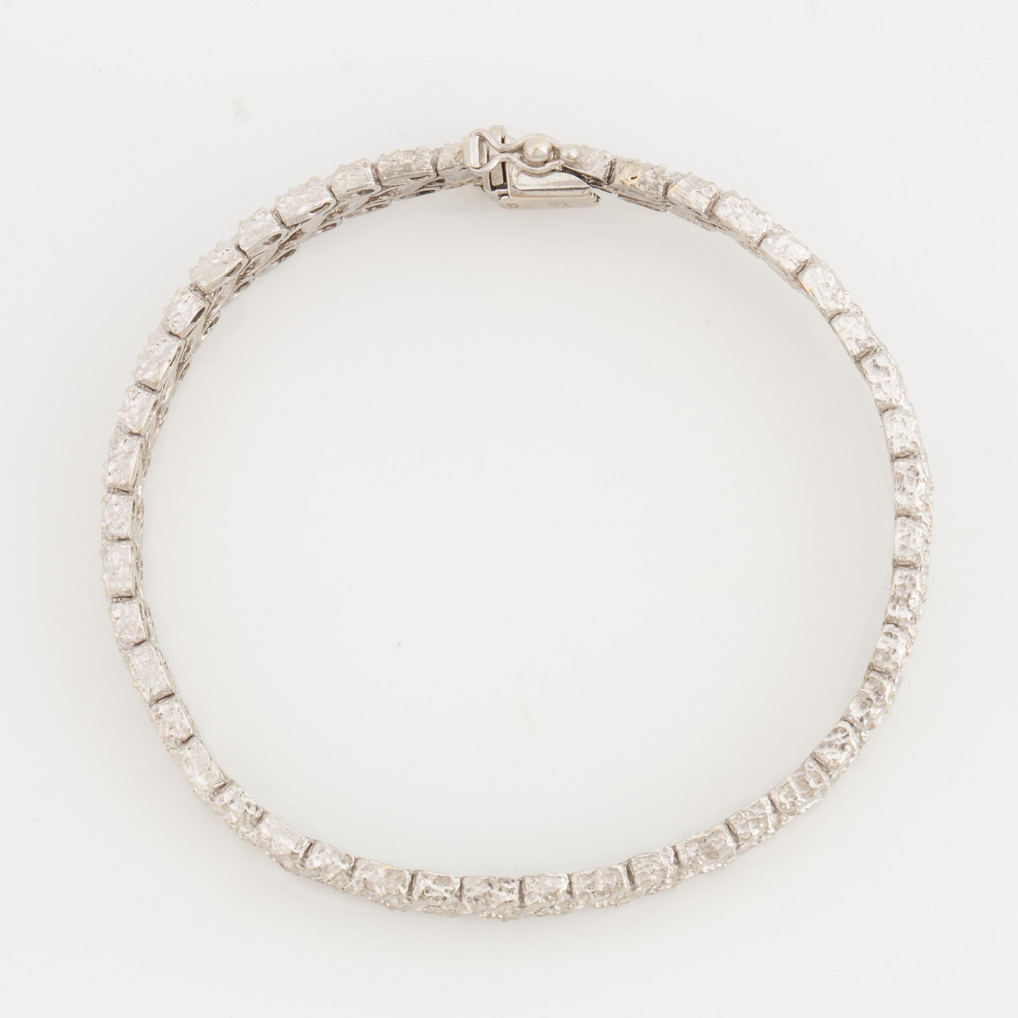 A fancy-link bracelet.