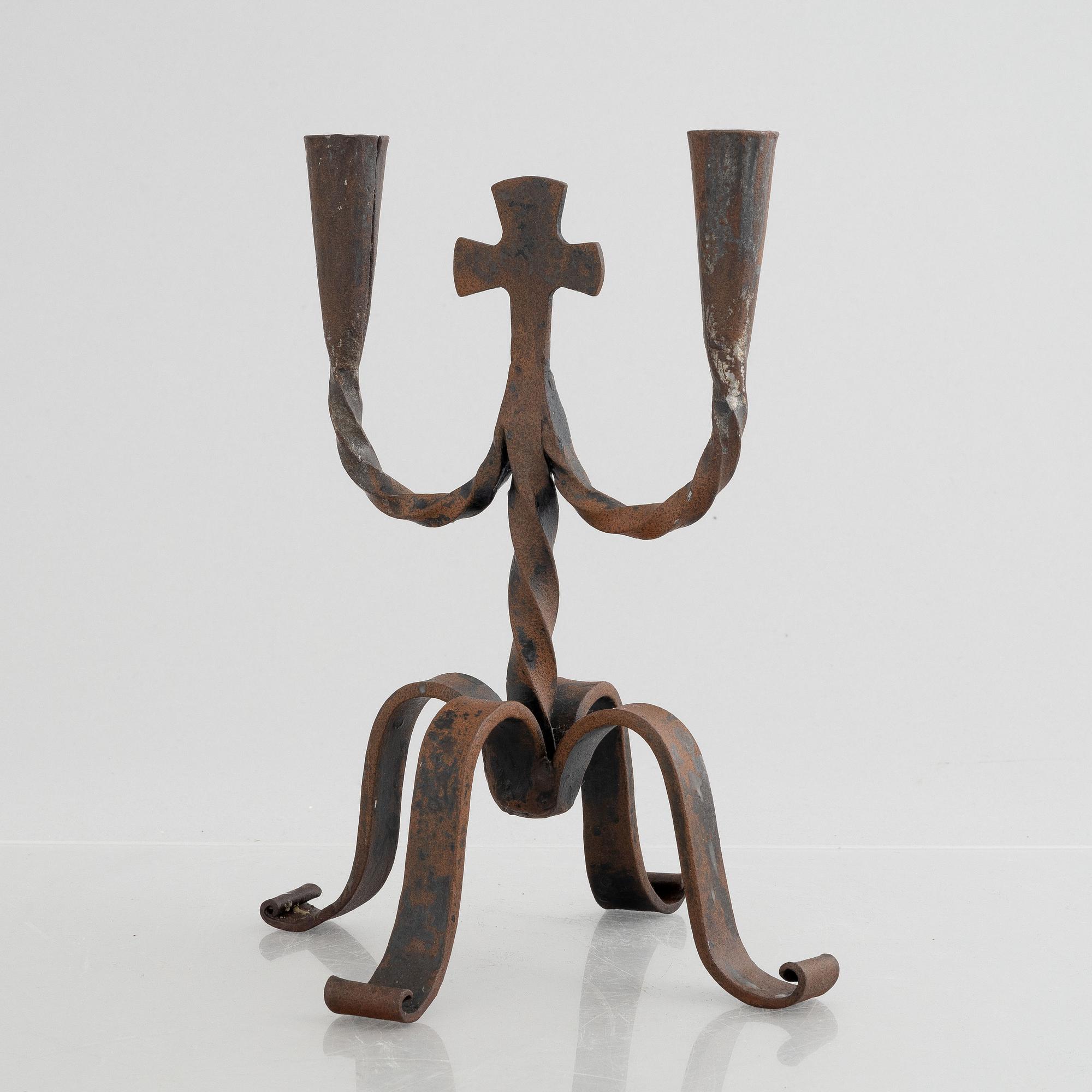 A two-light wrought-iron candlesticks, 20th century.