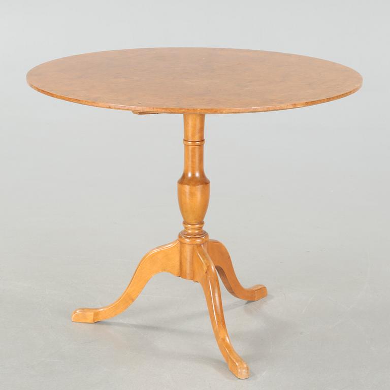 A folding table, made in the first half of the 20th century.