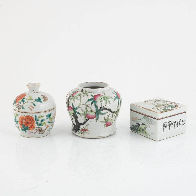 A Chinese famille rose peach vase, a jar and a box with covers, late Qing dynasty/20th century.