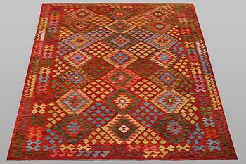 A carpet, Kilim, ca 306 x 200 cm.
