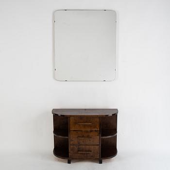 A stained birch chest of drawers and mirror, 1930's.