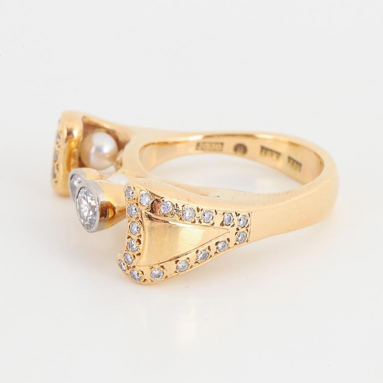 Brilliant-cut diamond and pearl ring.