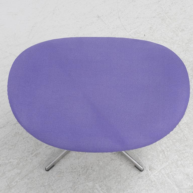 Arne Jacobsen, an armchair with footstool, "The Egg", Fritz Hansen, Denmark, 2003.