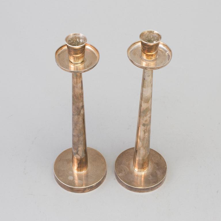 A pair of silver candlesticks, Strömdahl AB Hugo, Stockholm, 1962.