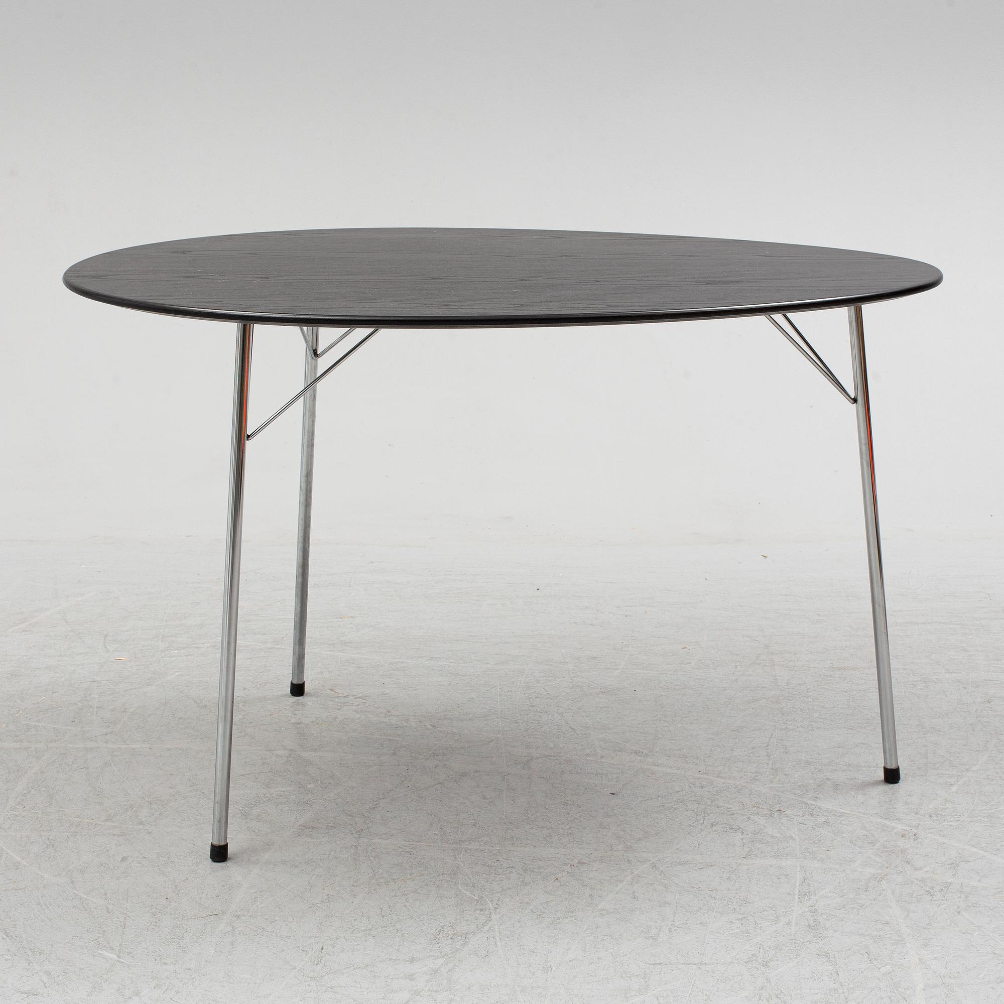 An Arne Jacobsen "Centenary Package" comprising three "Ant Chairs" and an eggshaped table, Fritz Hansen, Denmark.