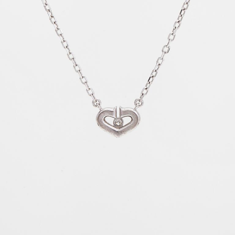Cartier, an 18K white gold 'C Heart of Cartier' necklace with diamonds approx. 0.09 ct in total.
