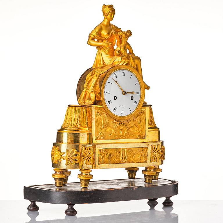 A French Empire 19th century gilt bronze mantel clock.