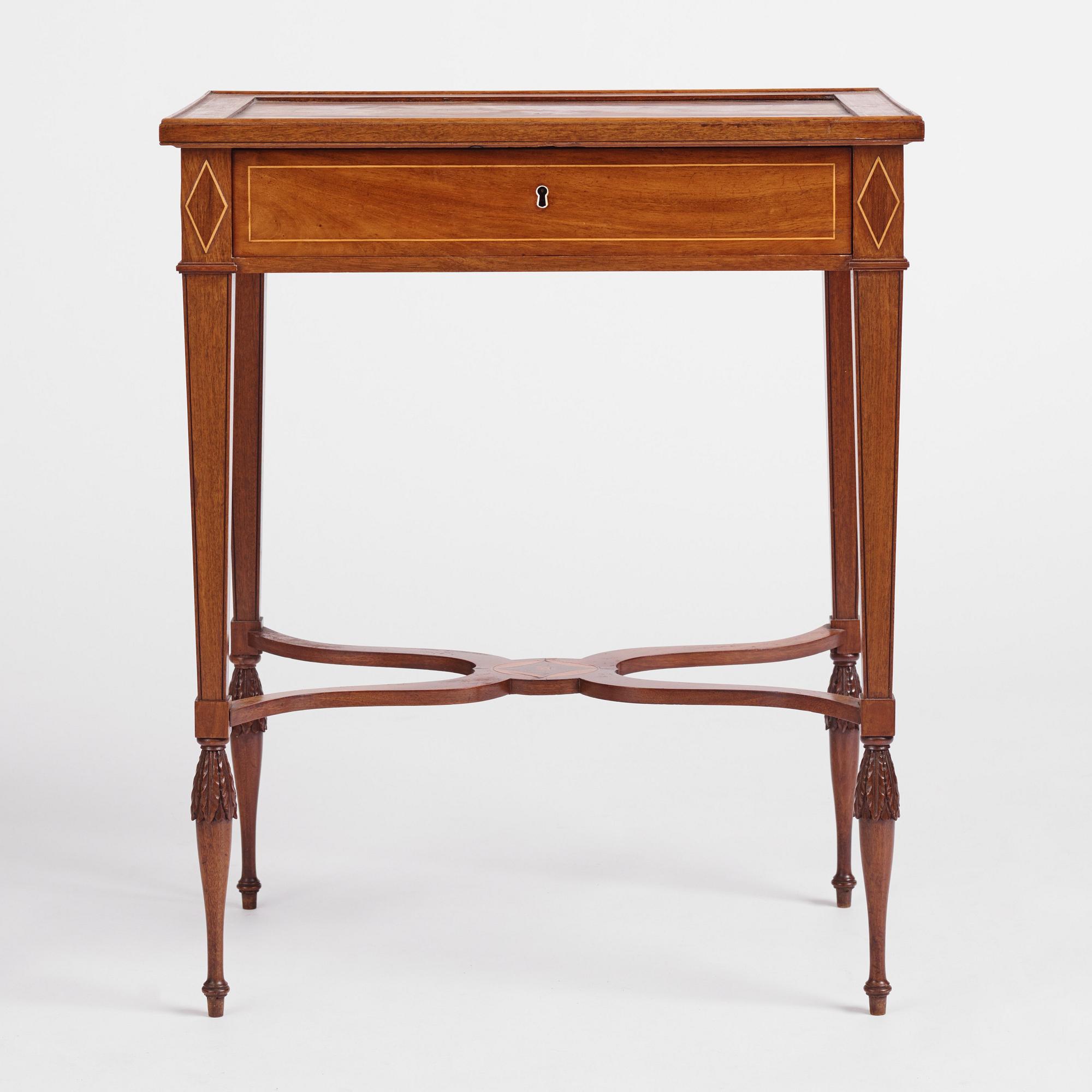 A late Gustavian mahogany table attributed to L. Qvarnberg (master in Stockholm 1801-1813).