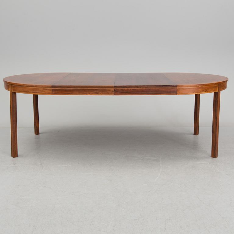 A rosewood dining table by Bertil Fridhagen for Bodafors.