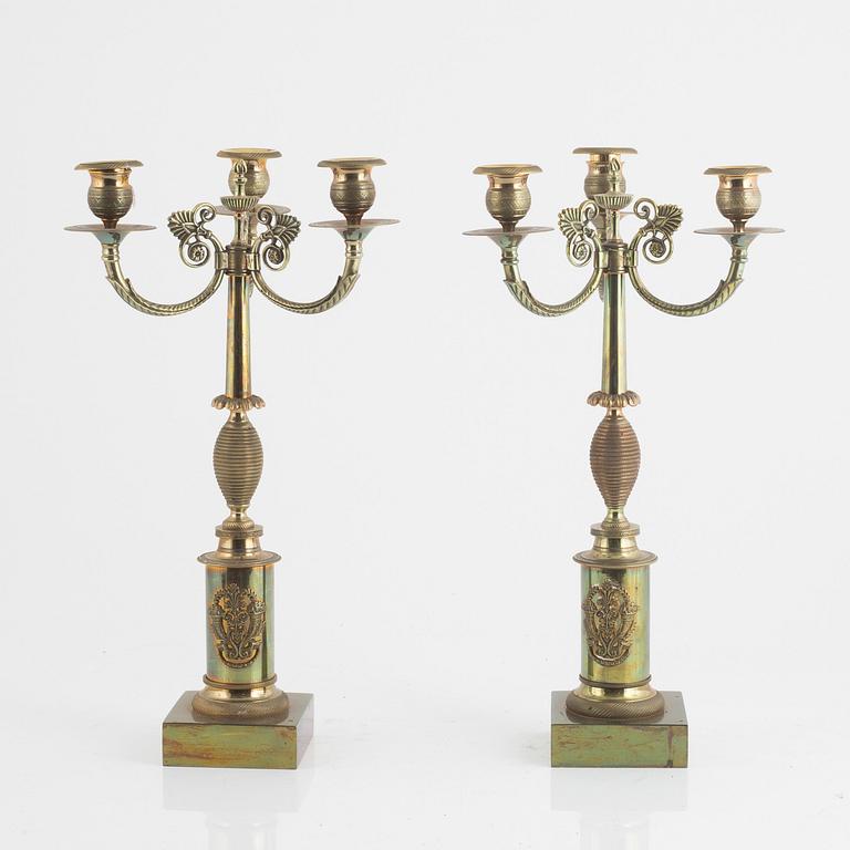 A pair of Empire style candelabra, circa 1900.