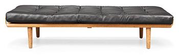 953. A Hans J Wegner oak and black leather daybed, Getama, Denmark 1950-60's.