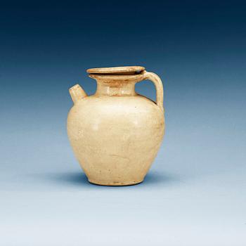 A cream glazed ewer with cover, Tang dynasty (618-907).